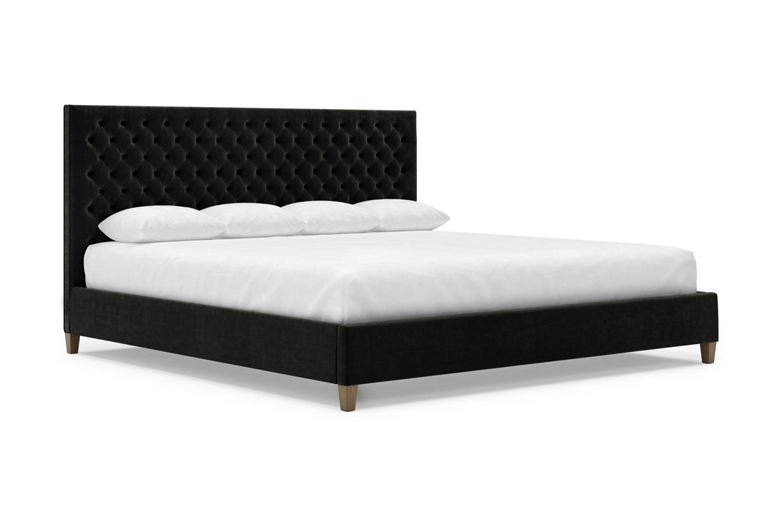 Angled View of Kincaid Bed Frame in Ebony#color_ebony