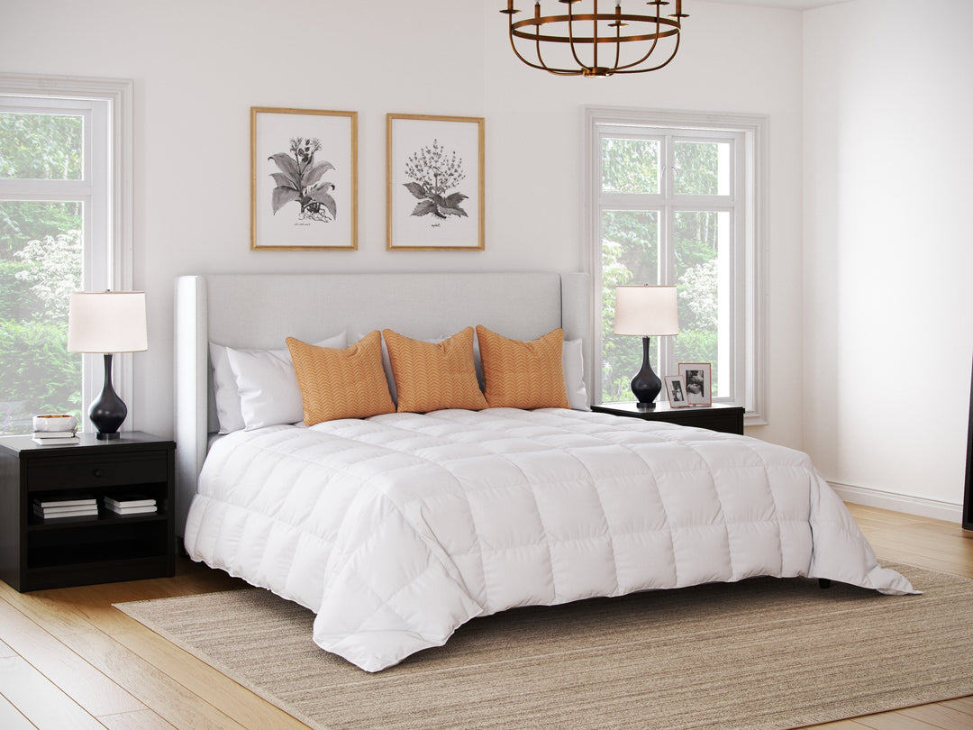 View of Comforter on White Bed